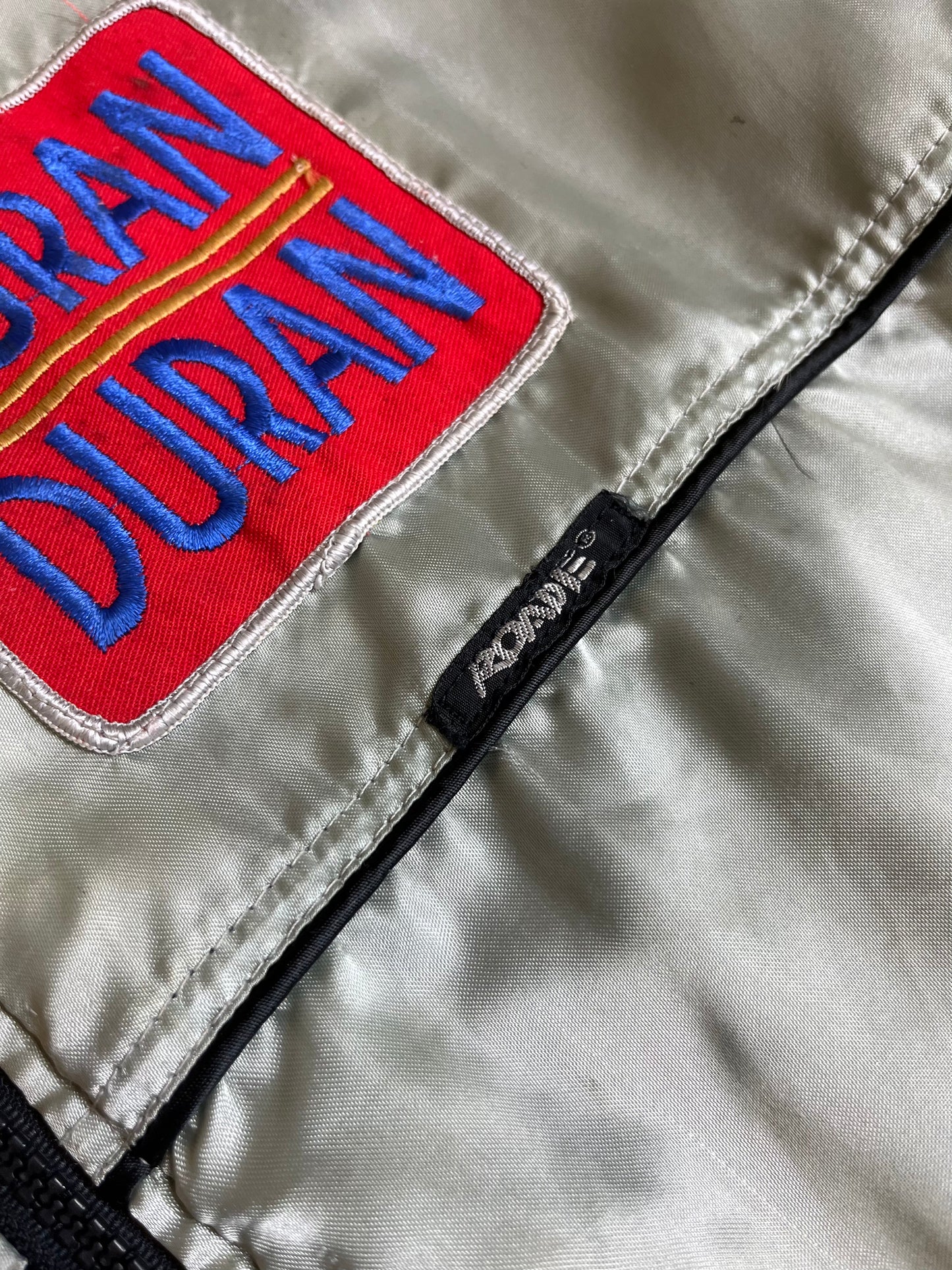 1980s Duran Duran Silver Satin Bomber Jacket by ROADIE